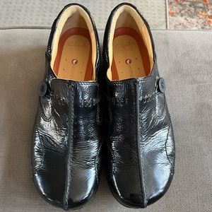 Clark’s Unstructured black patent leather slip ons. 8.5. Rubber sole. EUC.
